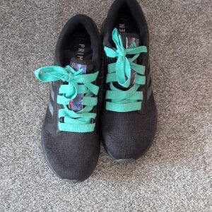 Adidas Black and Green Athletic Shoes with Vibrant Laces